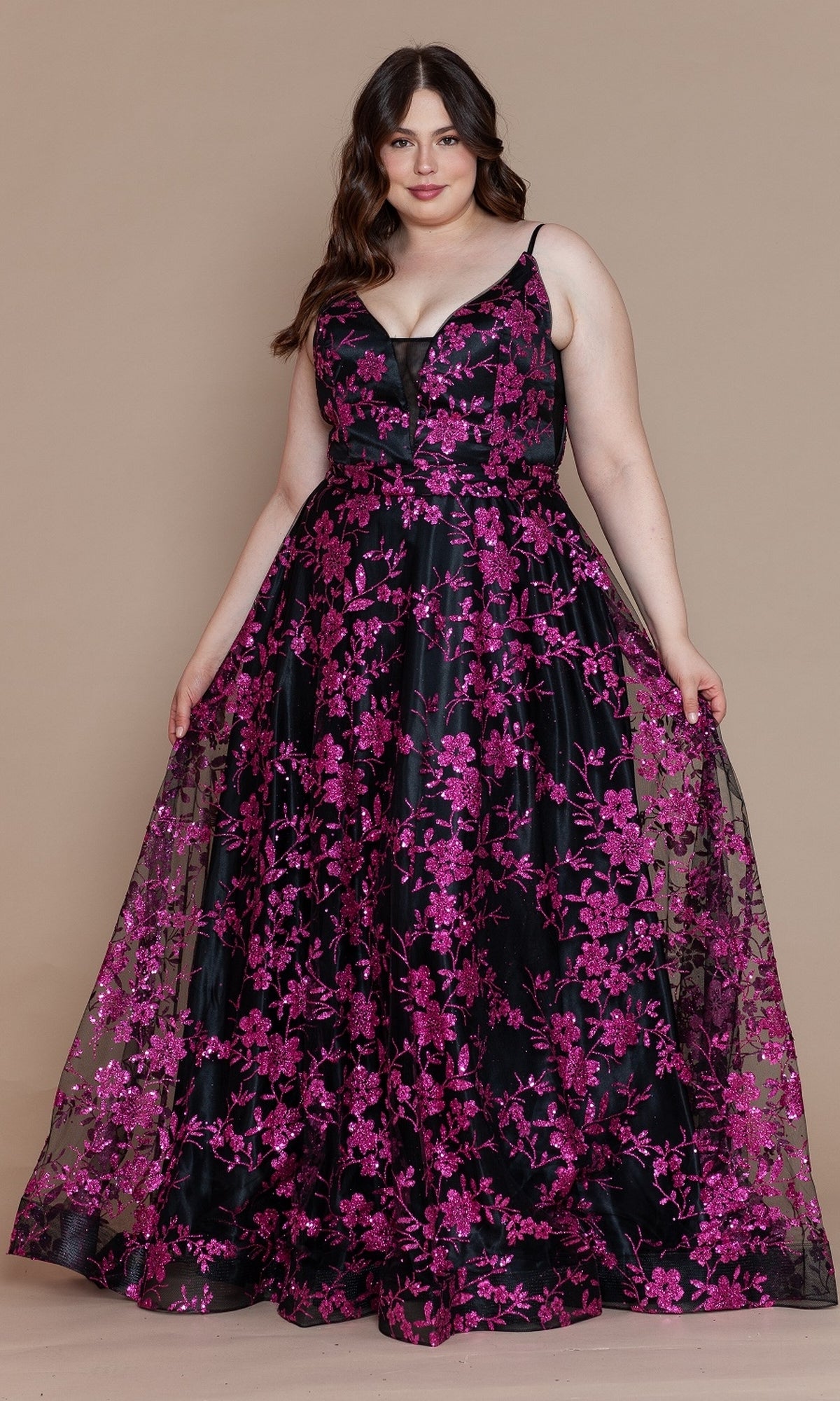 A woman models the Plus-Size Long Glitter Prom Gown (Poly USA W1134), a sleeveless formal dress with bright pink floral embroidery, against a plain beige background.